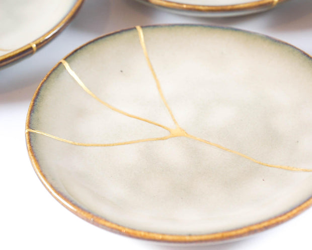 Small Beige Kintsugi Plate Adorned in 22K Gold