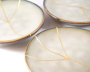 Small Beige Kintsugi Plate Adorned in 22K Gold