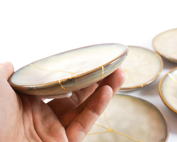 Small Beige Kintsugi Plate Adorned in 22K Gold