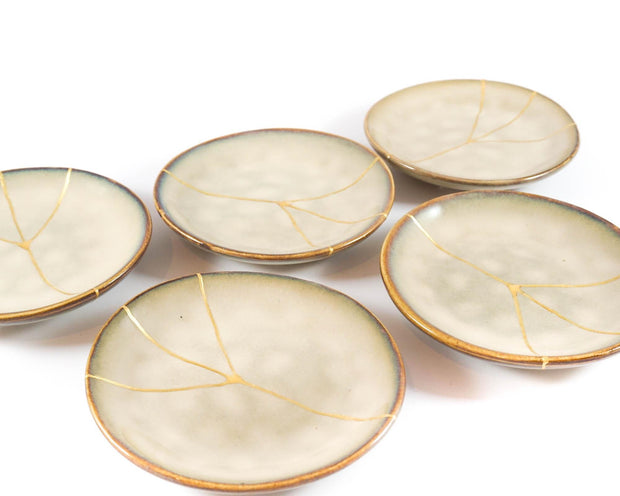 Small Beige Kintsugi Plate Adorned in 22K Gold
