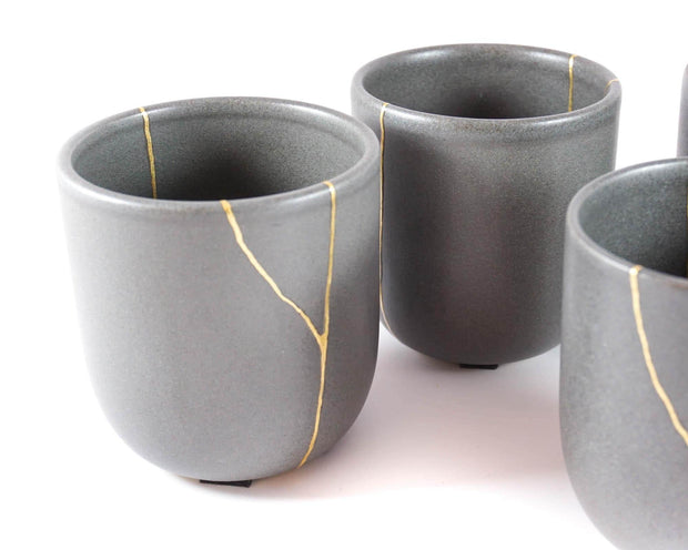 Elegant Grey Ceramic Cup with Gold Kintsugi