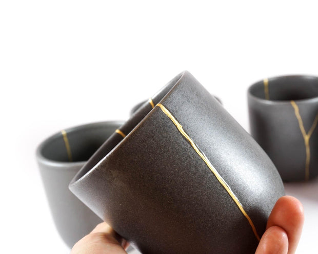 Elegant Grey Ceramic Cup with Gold Kintsugi