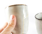 Elevate Your Tea Experience with This Unique Light Grey Kintsugi Ceramic Cup Featuring Golden Veins - A Minimalist Wabi Sabi Gift