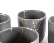Elegant Grey Ceramic Cup with Gold Kintsugi