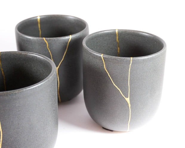 Elegant Grey Ceramic Cup with Gold Kintsugi