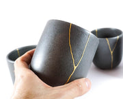 Elegant Grey Ceramic Cup with Gold Kintsugi