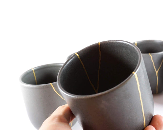 Elegant Grey Ceramic Cup with Gold Kintsugi