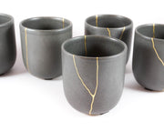 Elegant Grey Ceramic Cup with Gold Kintsugi